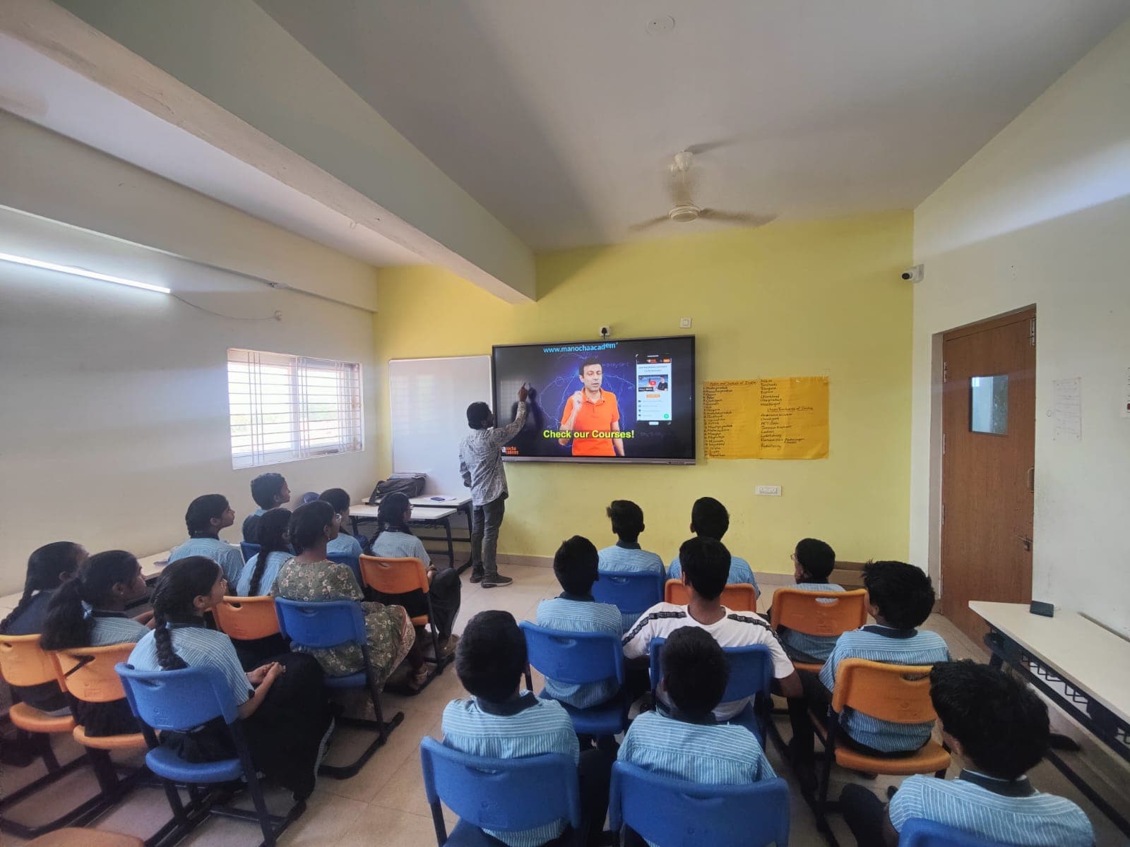 Teacher with students